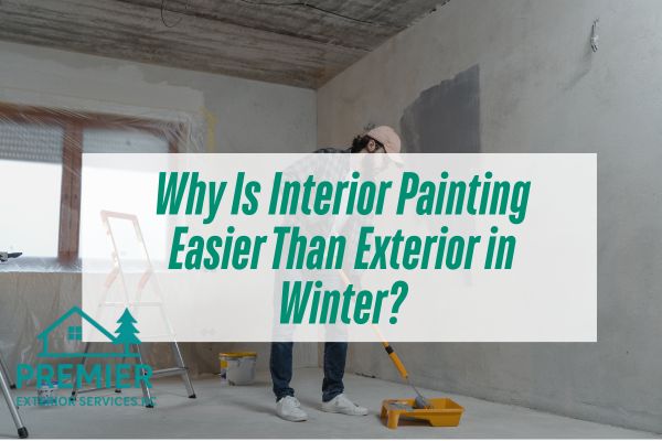 man-painting-the-wall-with-a-caption-Why-Is-Interior-Painting-Easier-Than-Exterior-in-Winter.