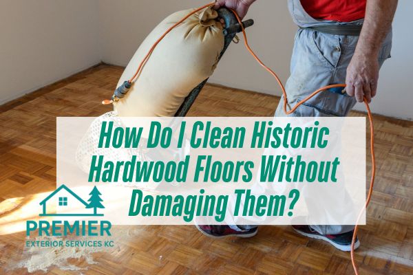 man cleaning the hardwood floor with a caption How Do I Clean Historic Hardwood Floors Without Damaging Them?
