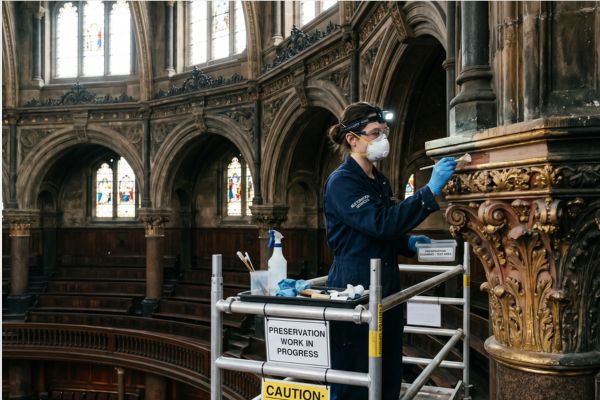 woman cleaning the building